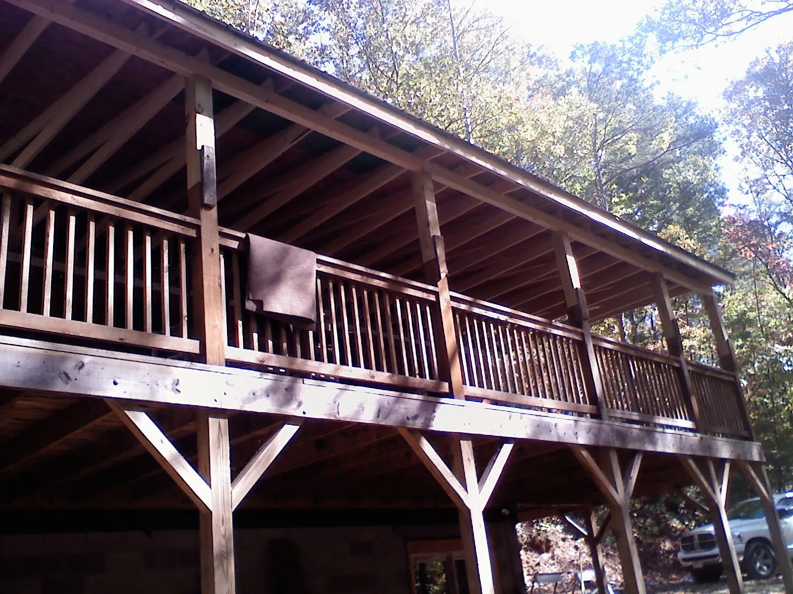 Timber framing under a new elevated porch and deck — Roof Leak Repair in Frederick by Roofing Brothers